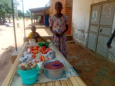 Mrs. Ajidiru at her produce stall